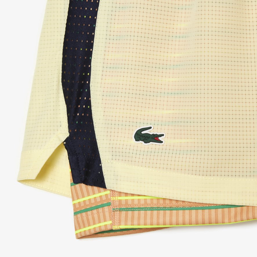 Yellow lacoste shorts on sale